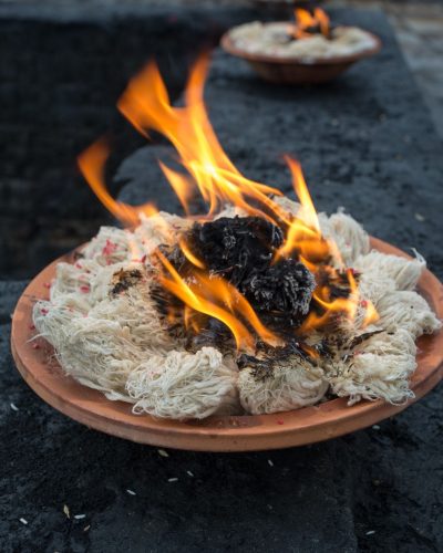 Burning incense sticks outside Kathmandu