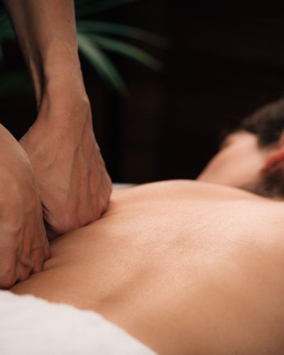 Woman Enjoying Deep Tissue Massage